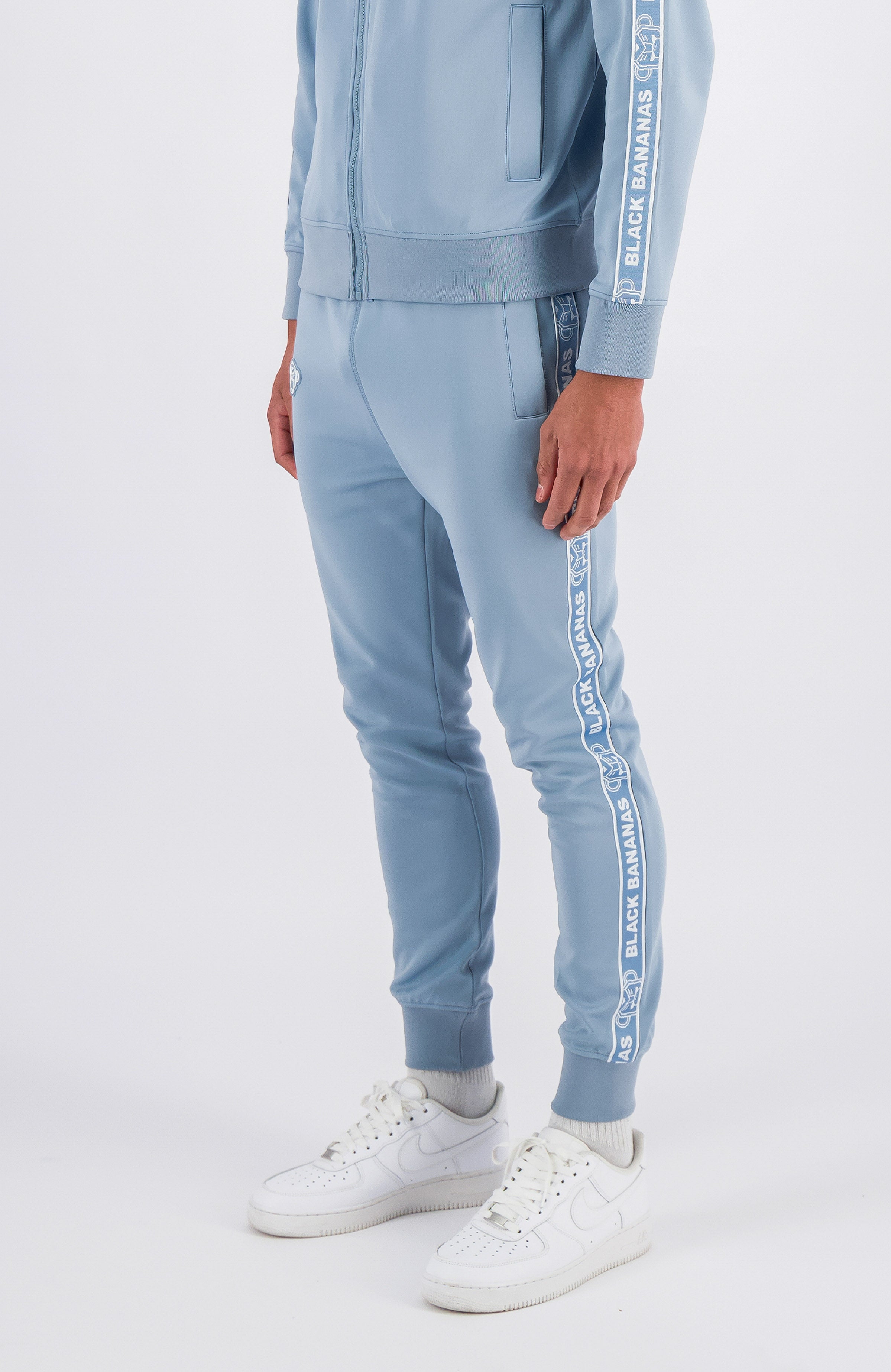 TAPED TRACKPANTS | Light Blue